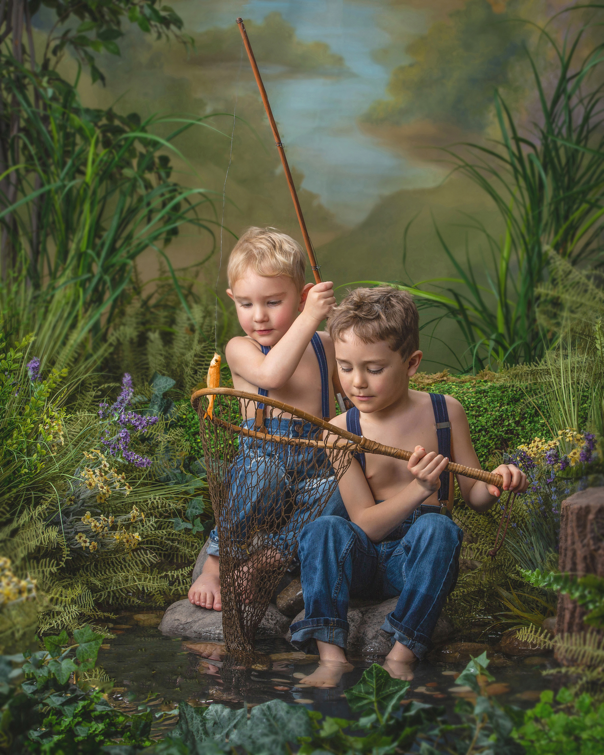 Fine art portrait of two young boys fishing in a rustic pond setting, photographed by Studio C Fine Art Photography.